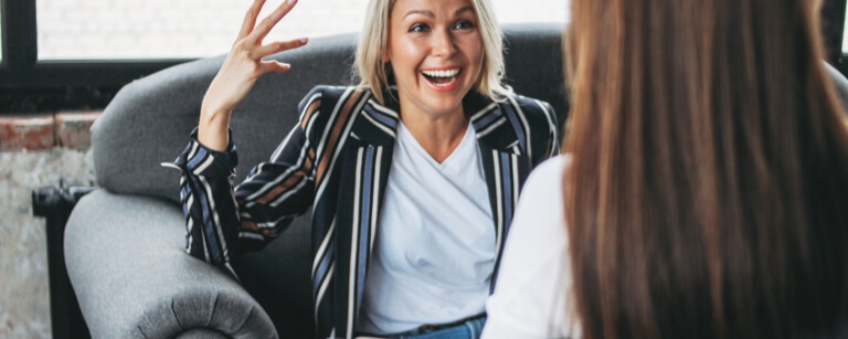 A life coach is happy that she has life coaching insurance

