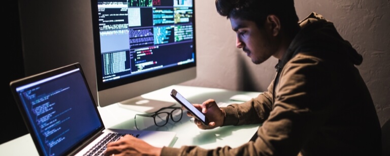 Software developer typing code