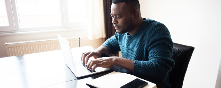 A digital marketer working at a desk