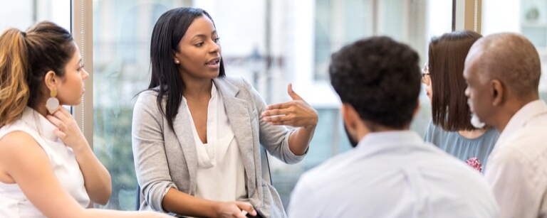 Management consultant speaks to group