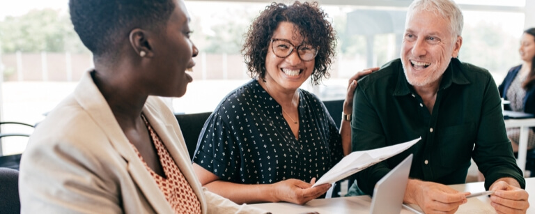 Mortgage broker meets with two clients