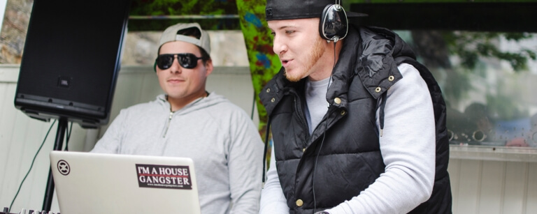 A DJ performing with turntables