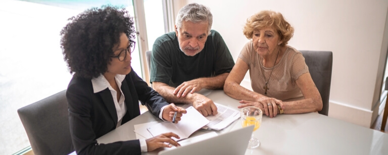 Real estate discussing plans with buyers