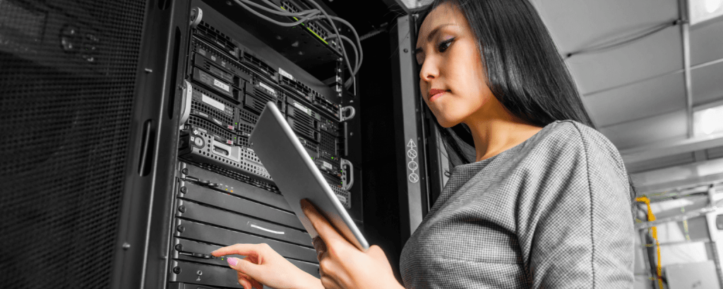 IT technician works on servers