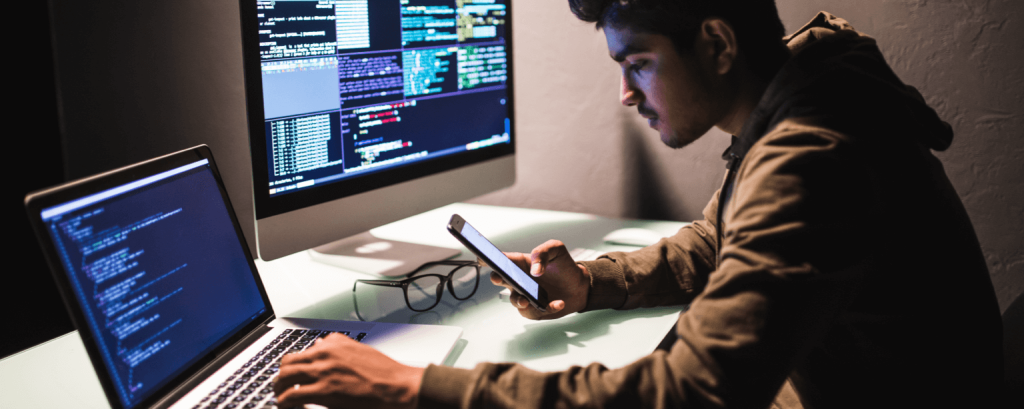 Software engineer works on code