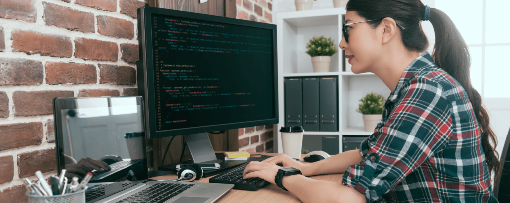 Software developer works on code