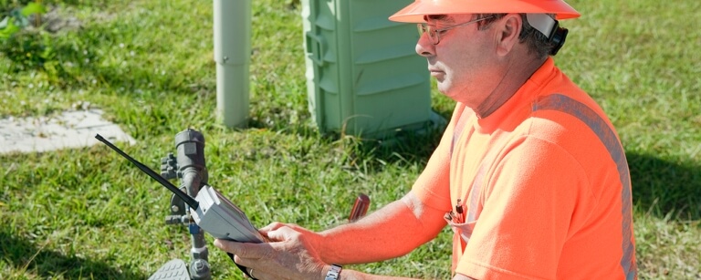 Utility contractor in field
