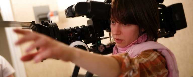 Videographer holding camera