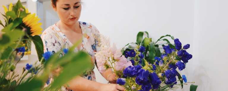 A florists prepares a bouquet