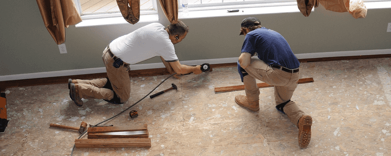 Carpenters install trim