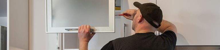 A man using a screwdriver