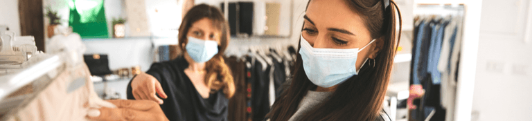 Women shopping with masks