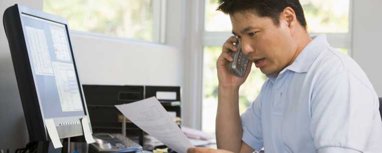 Mortgage broker speaks on phone