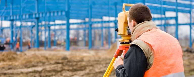 Land surveyor working in the field