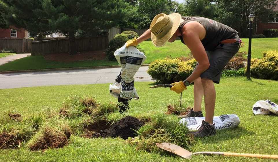 Finding more customers means you can stay busy, like this landscaper working on a customer's lawn.