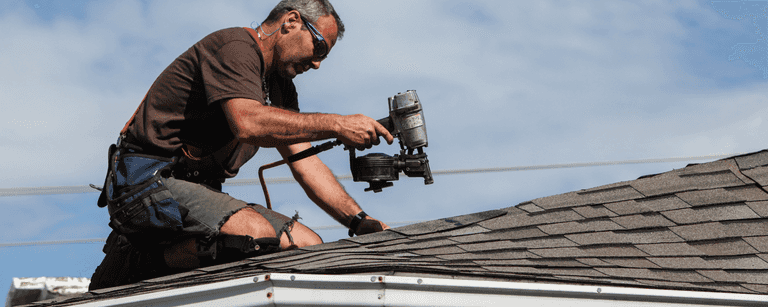 Contractor installs roofing