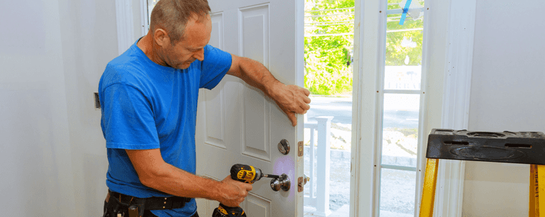 Contractor installs door knob