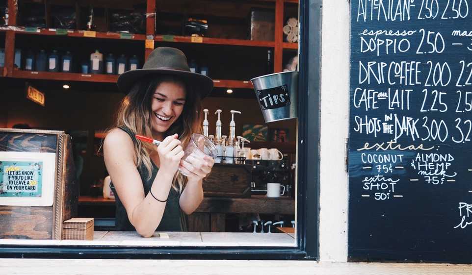 Our end-of-year secrets will help your small business successfully wrap up 2019, like this excited barista.