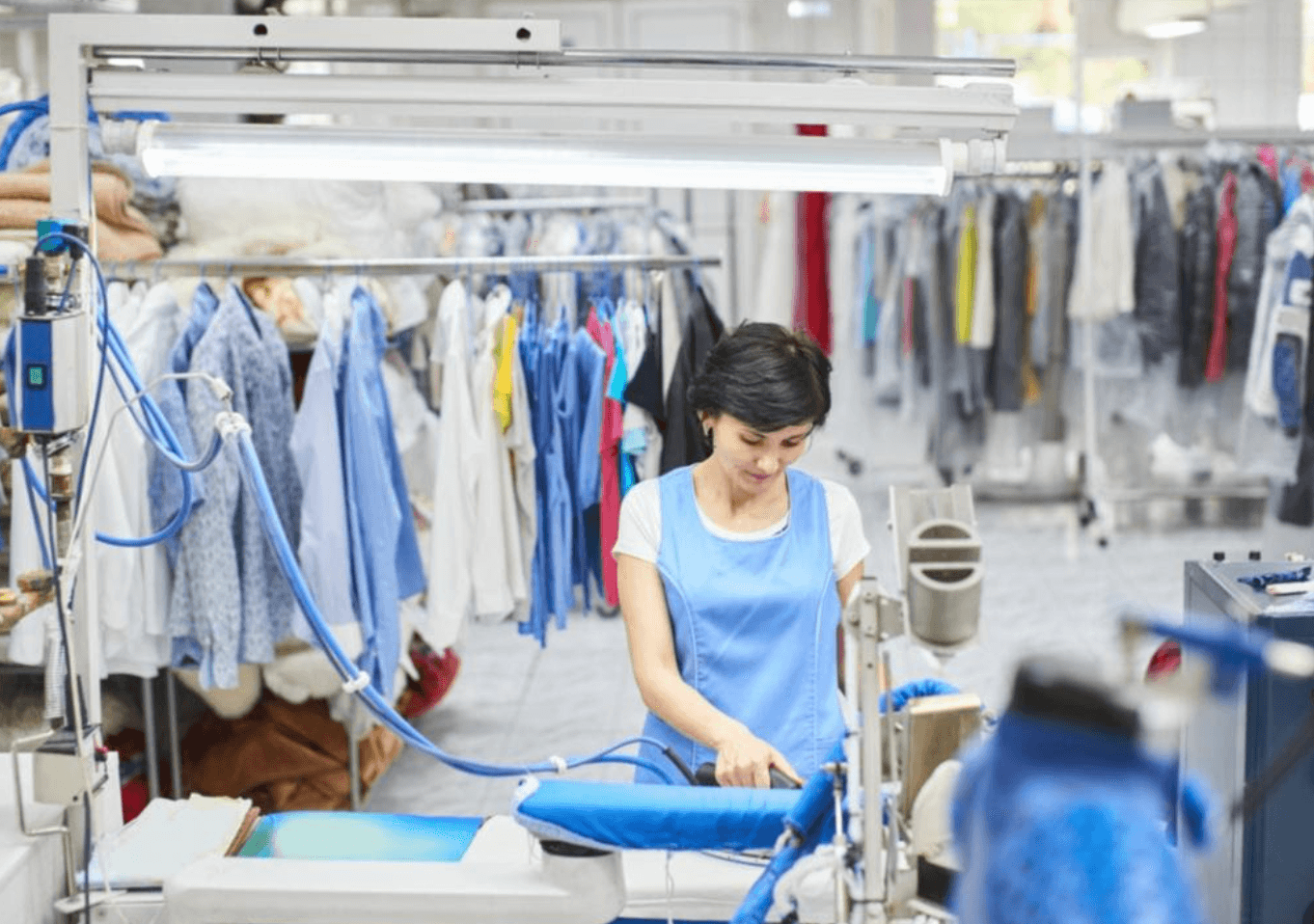 woman cleans a garment