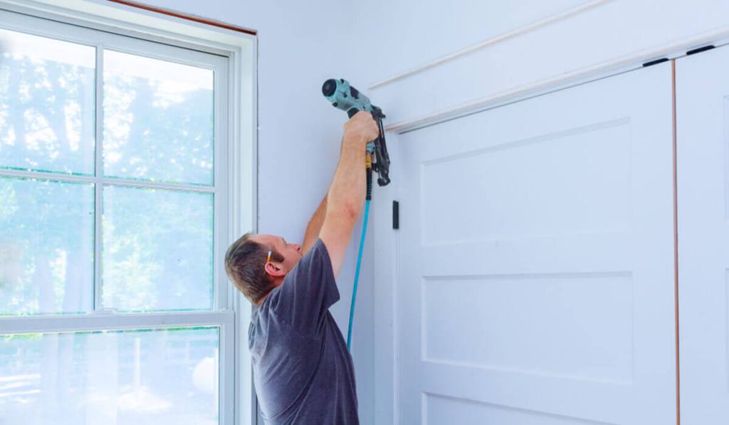The differences between a handyman and a contractor (like the contractor in this photo) might surprise you.