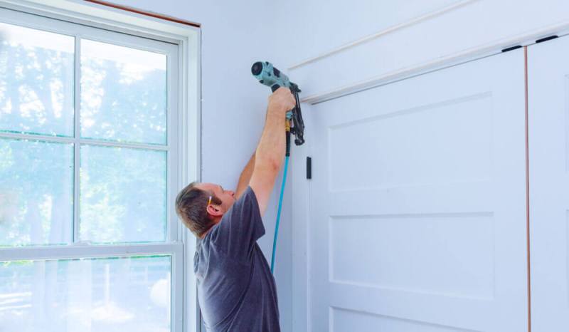 The differences between a handyman and a contractor (like the contractor in this photo) might surprise you.