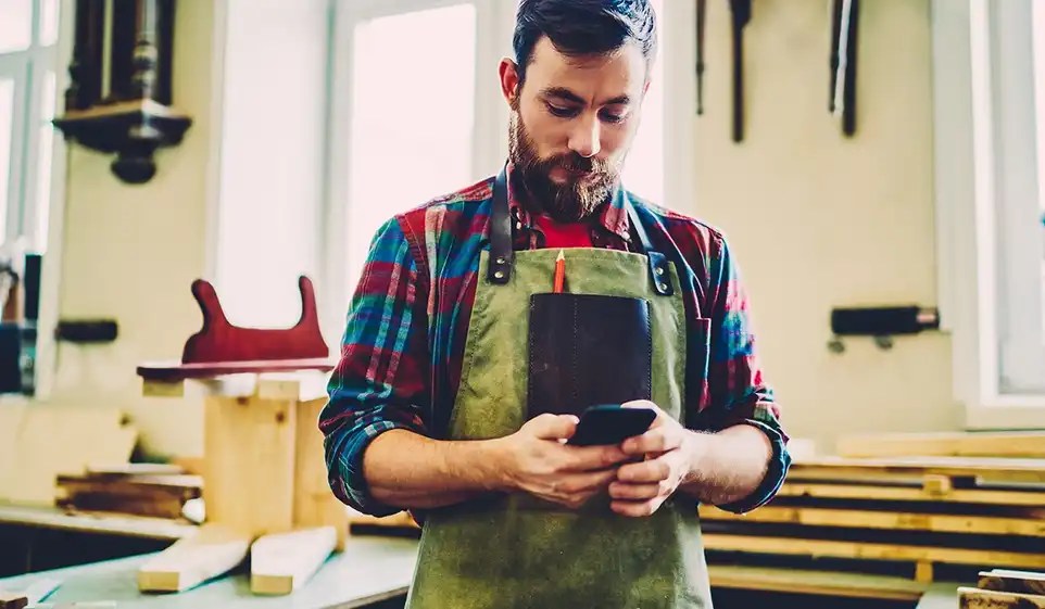 Man checking whether he needs to get business insurance