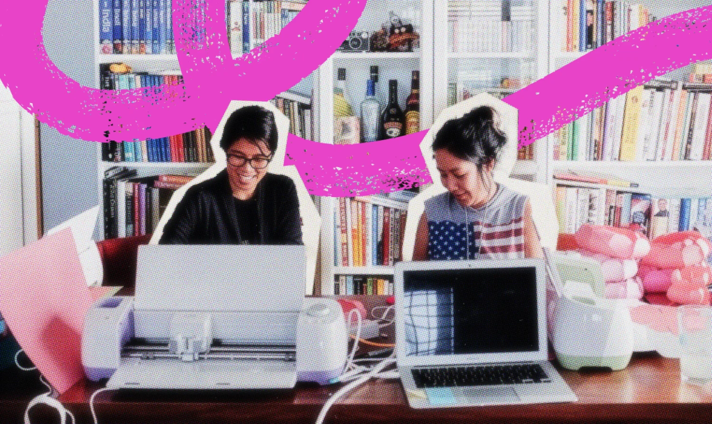 Two business owners working on a marketing plan