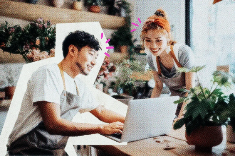 Two business owners talking in their shop.