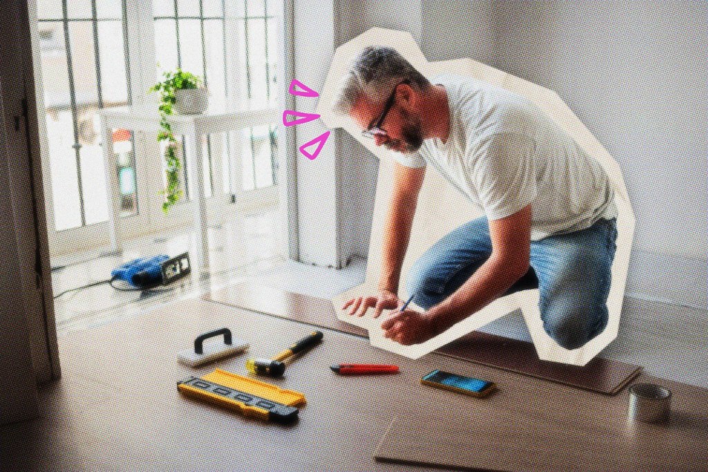 Contractor installing wood flooring