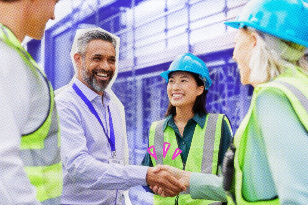 Architect and construction workers greeting each other.