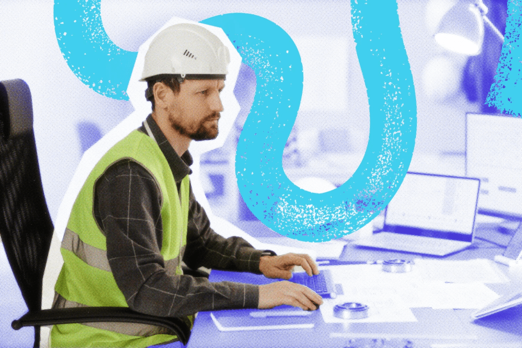 Construction manager working on an estimate at his desk.