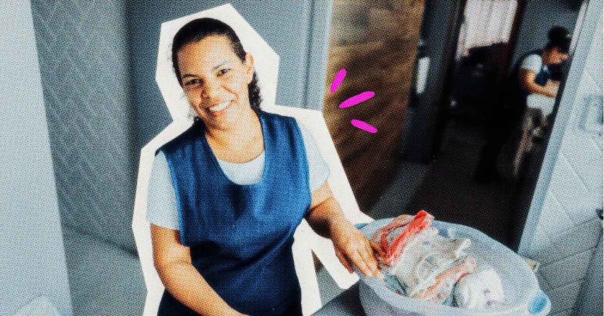 housekeeper folding laundry
