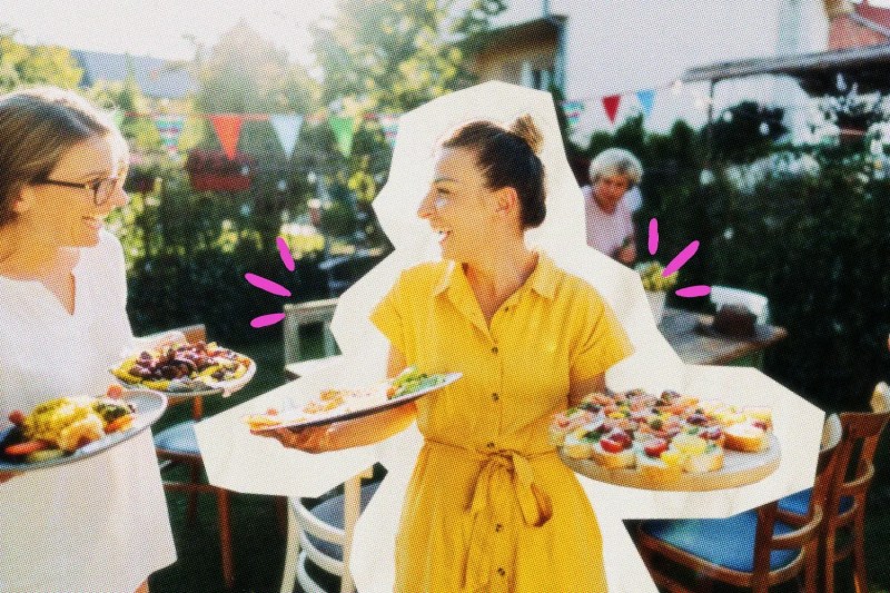 Caterer carrying trays at an event.