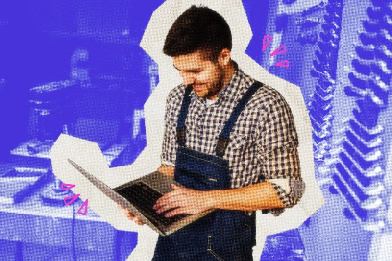 Handyman looking at his laptop