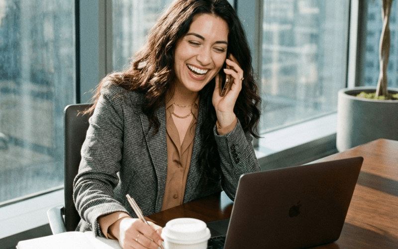 Happy consultant on the phone in an office environment